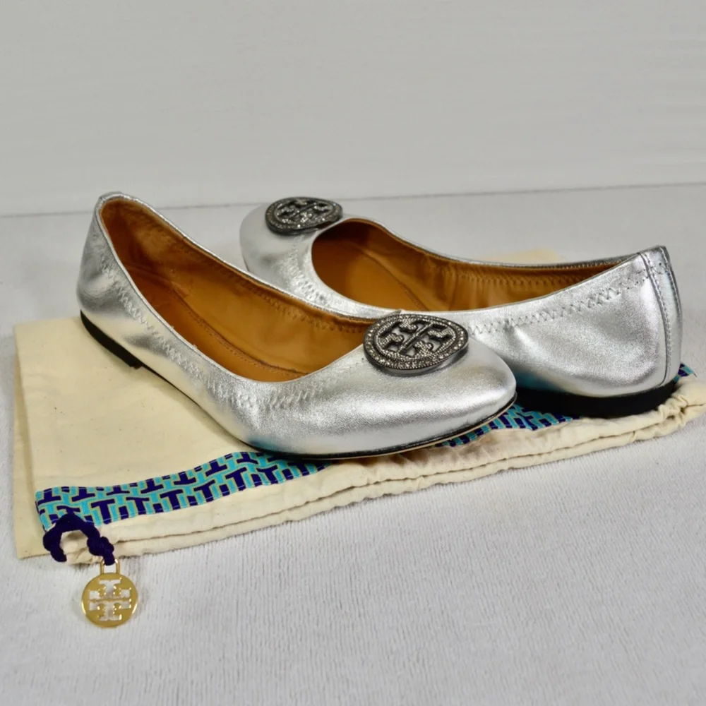 Tory Burch Women's Liana Round Toe Rhinestone Logo Metallic Leather Ball…